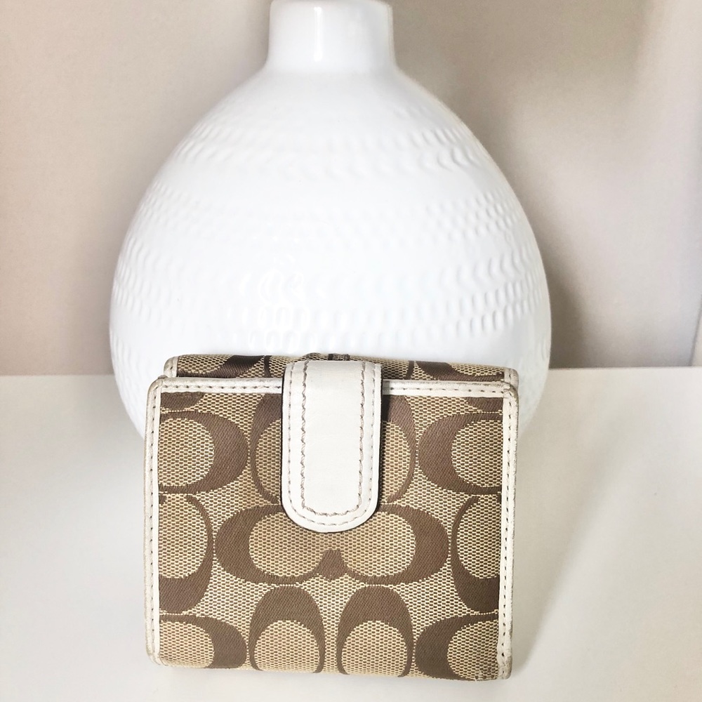 SOLD- Coach multiple fold wallet white